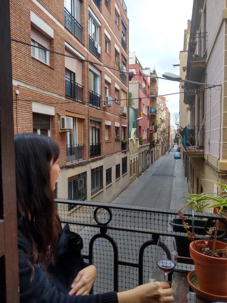 Fabi at our balcony looking an empty street